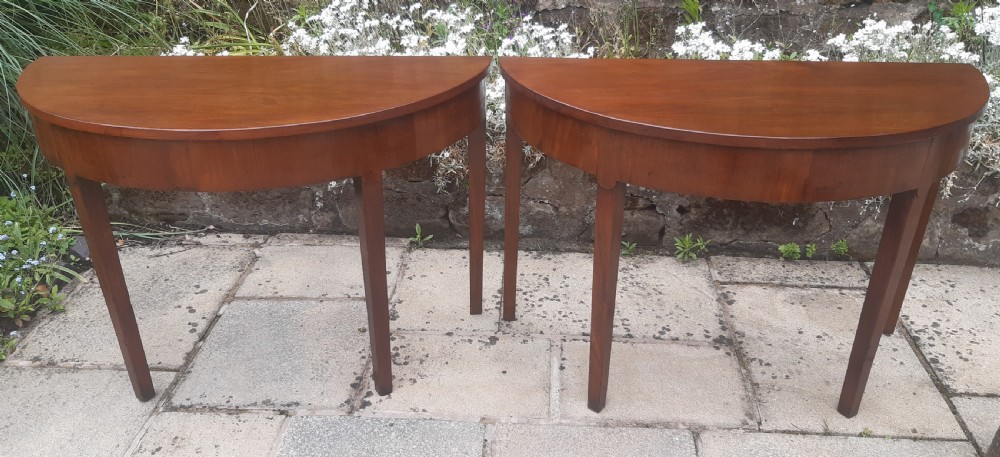 Pair of console demi lune tables