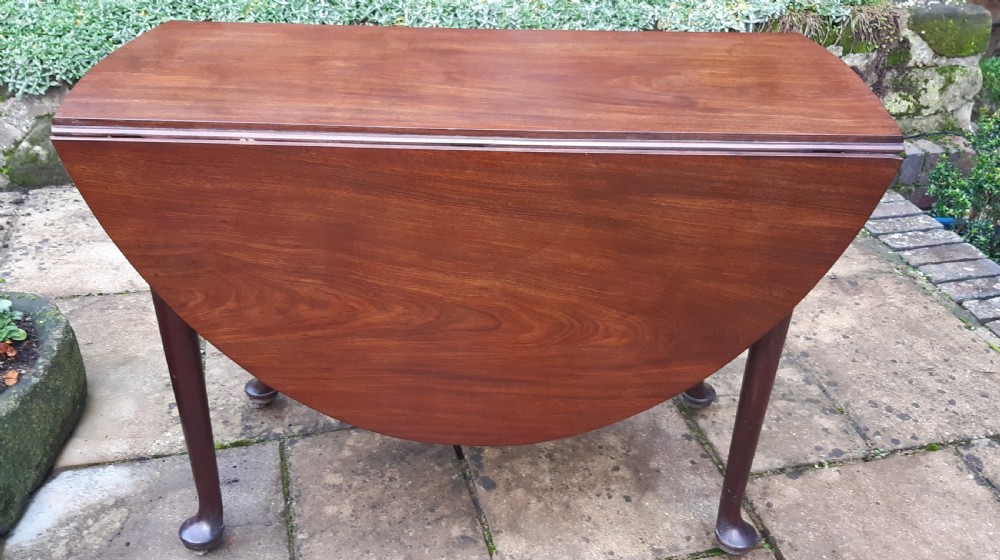 Georgian mahogany drop leaf dining table  View II