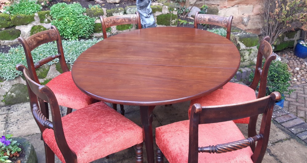 Georgian mahogany drop leaf dining table  View V