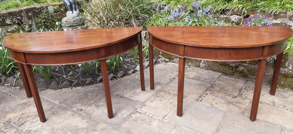Pair of large demi lune tables mahogany Georgian 