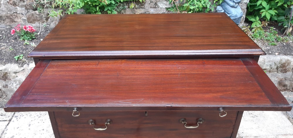 Small 18th century mahogany chest of drawers with brushing slide  View IX