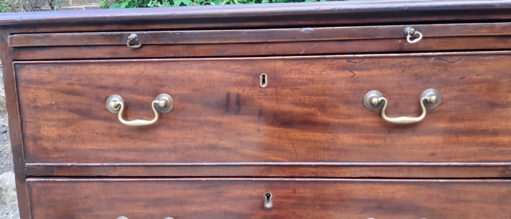 Small 18th century mahogany chest of drawers with brushing slide  View XI