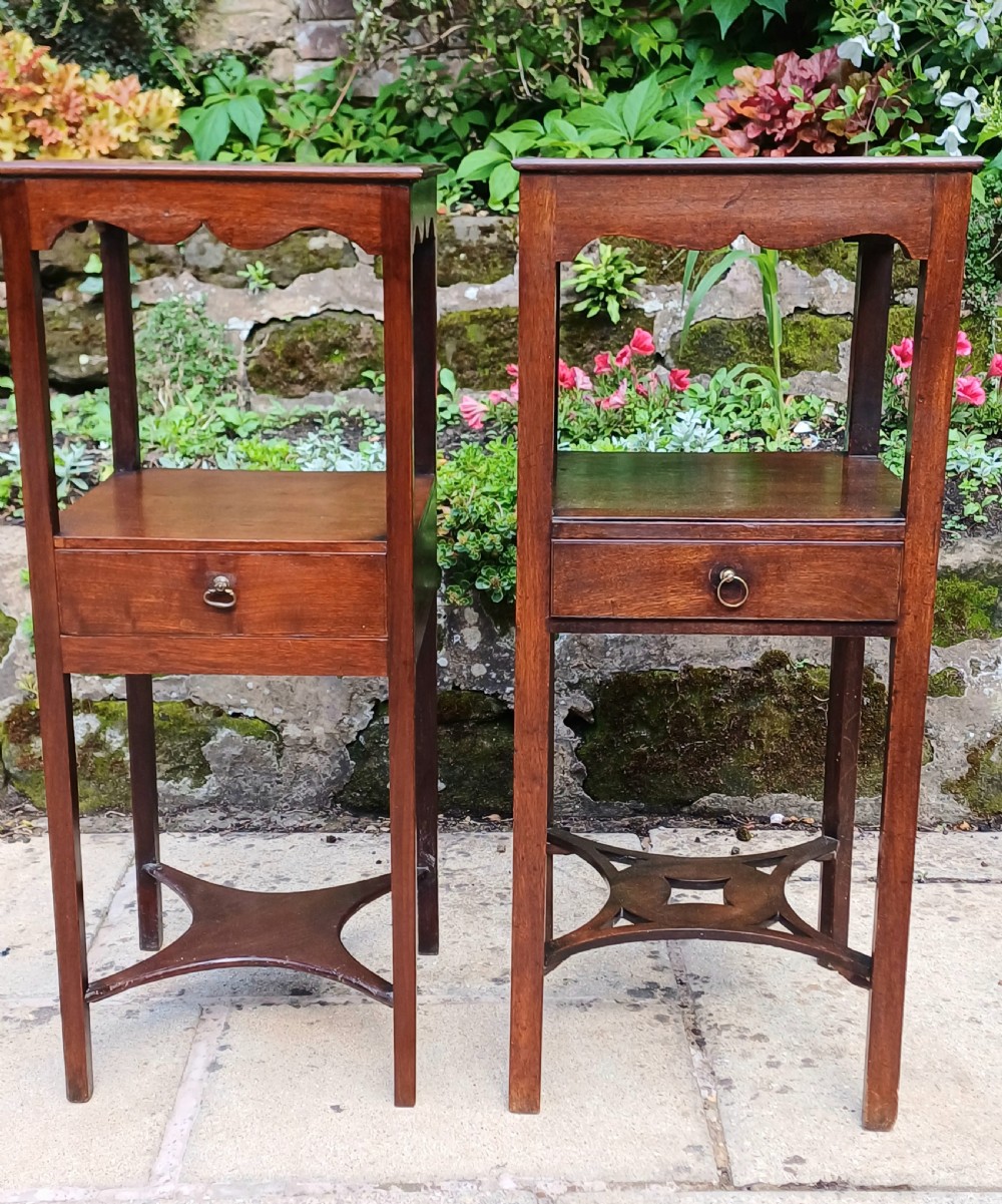 A pair of matched Georgian mahogany bedside tables 