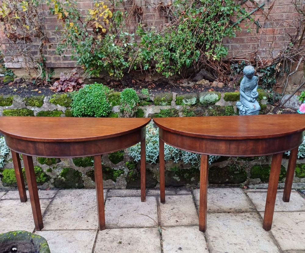 A pair of demi lune console mahogany Georgian 