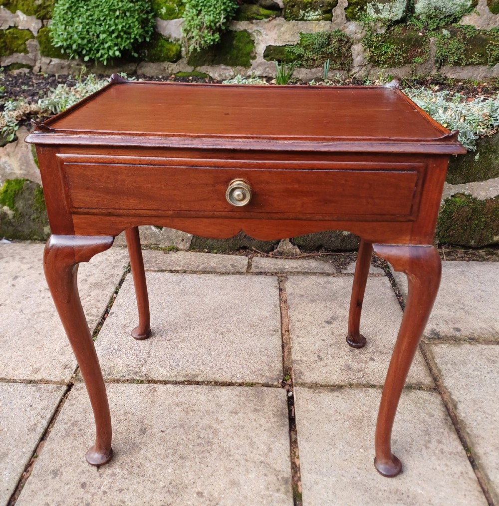 Low mahogany table cabriole legs