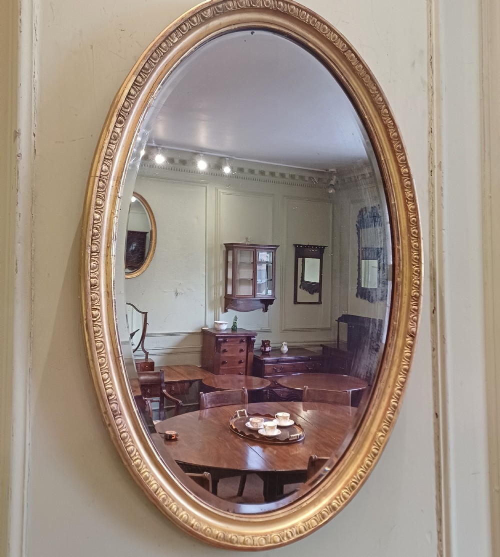 Oval giltwood gilt mirror View II