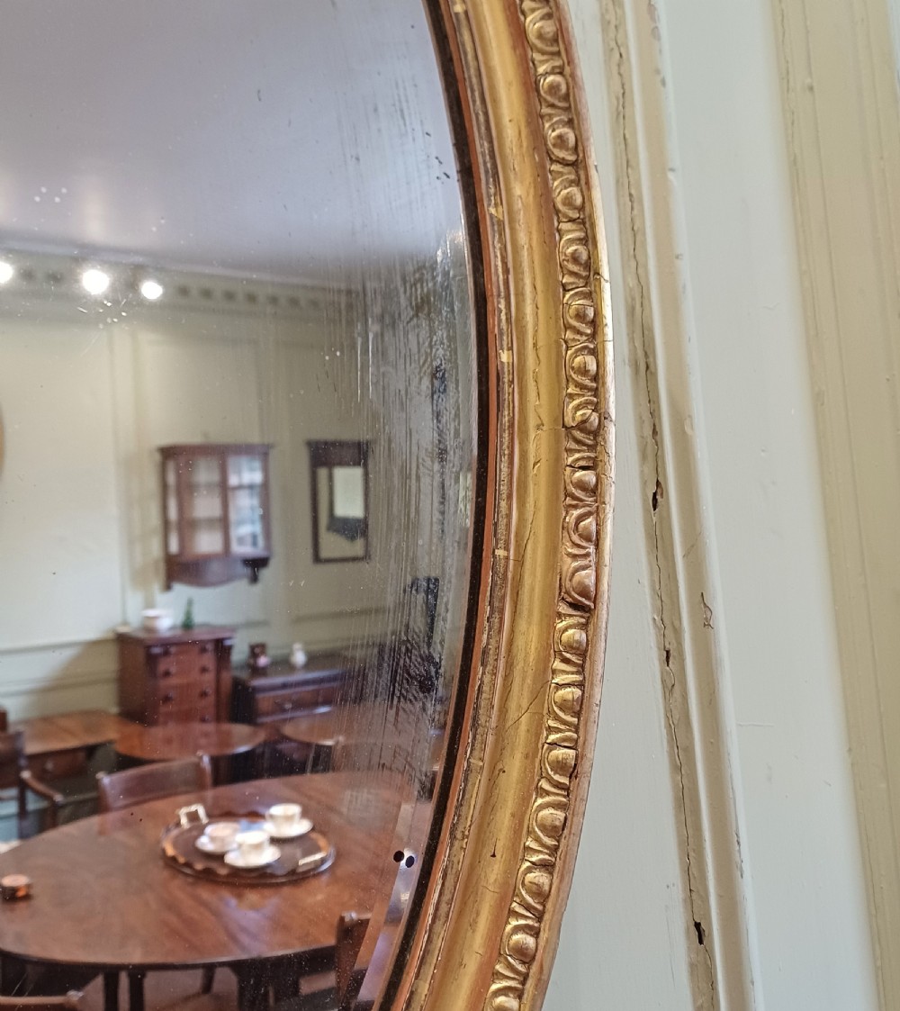 Oval giltwood gilt mirror View III