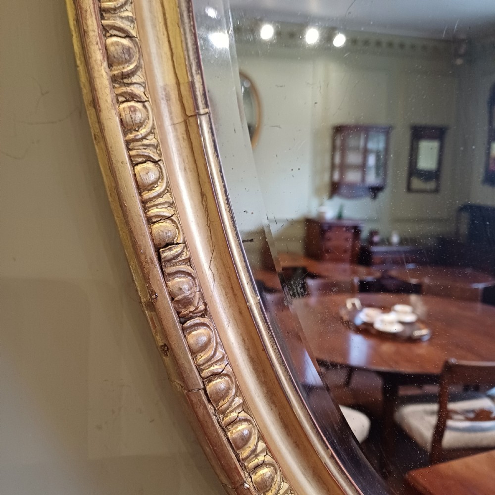 Oval giltwood gilt mirror View IV
