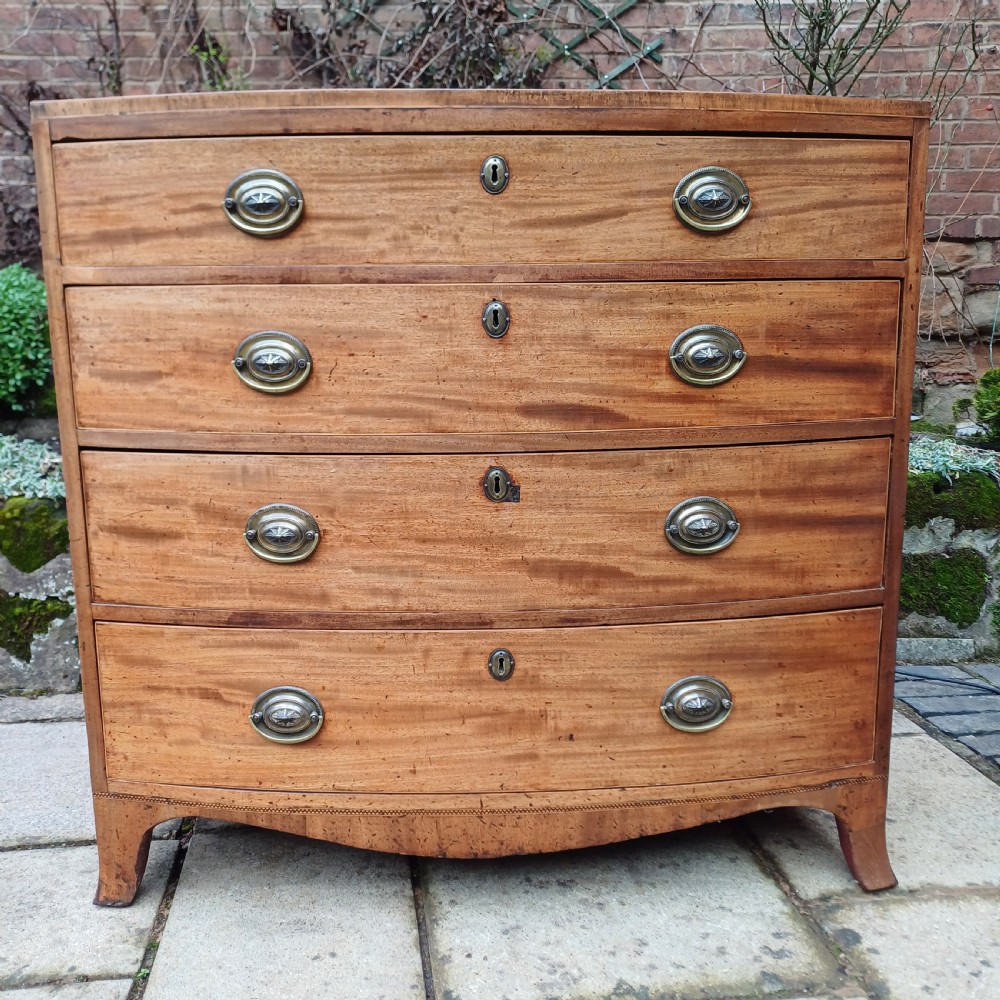 Bow front  fronted chest of drawers.  Georgian  View II