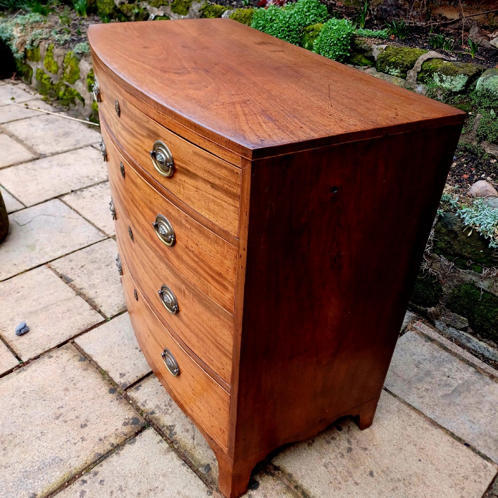 Bow front  fronted chest of drawers.  Georgian  View V