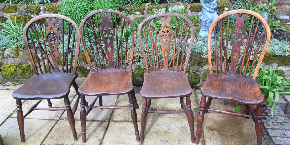 4 Early 19th century wheelback Windsor chairs
