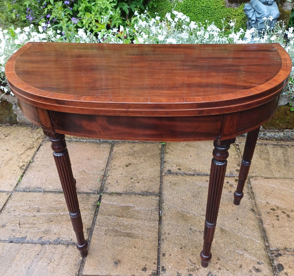 Pretty Regency demi lune mahogany table