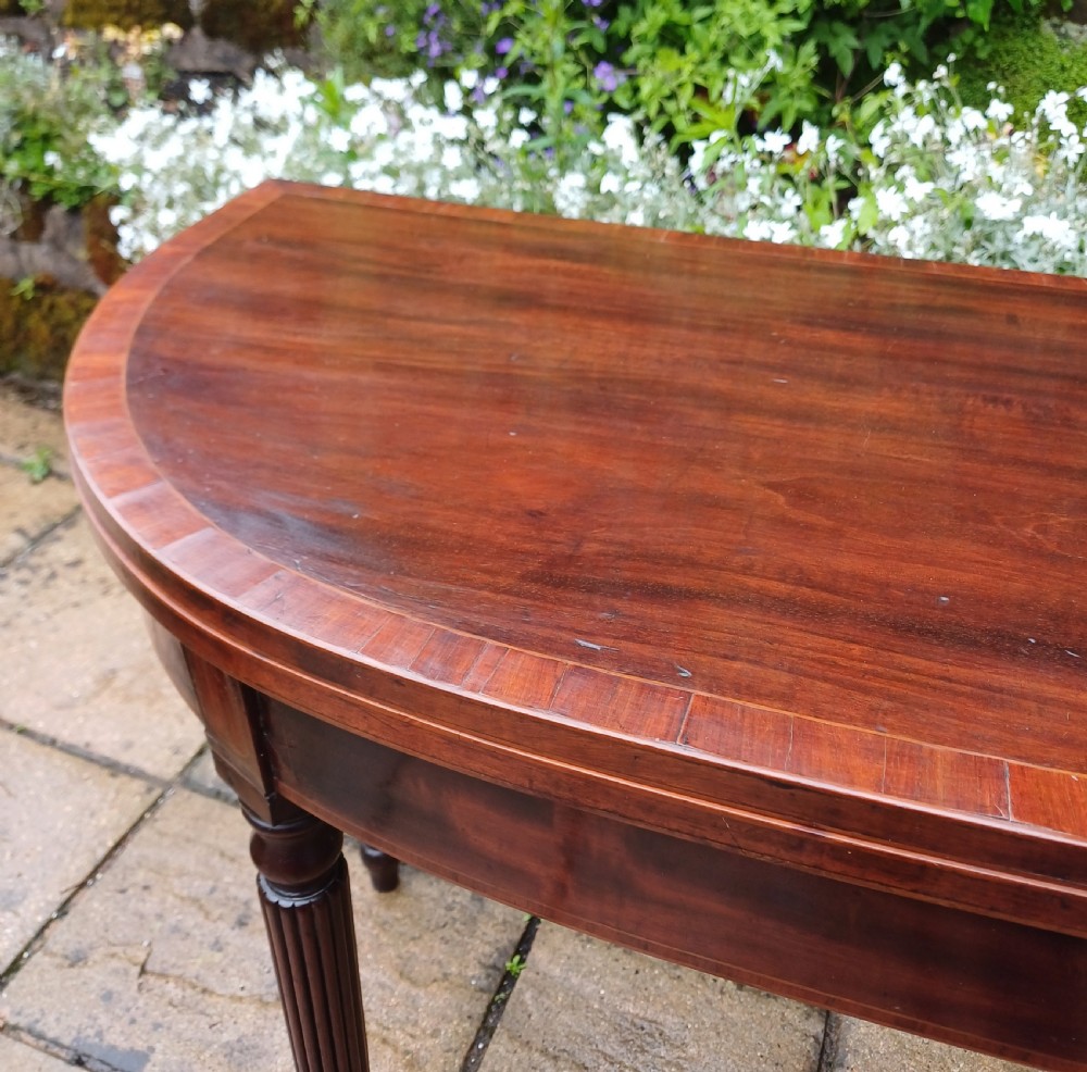 Pretty Regency demi lune mahogany table View VIII