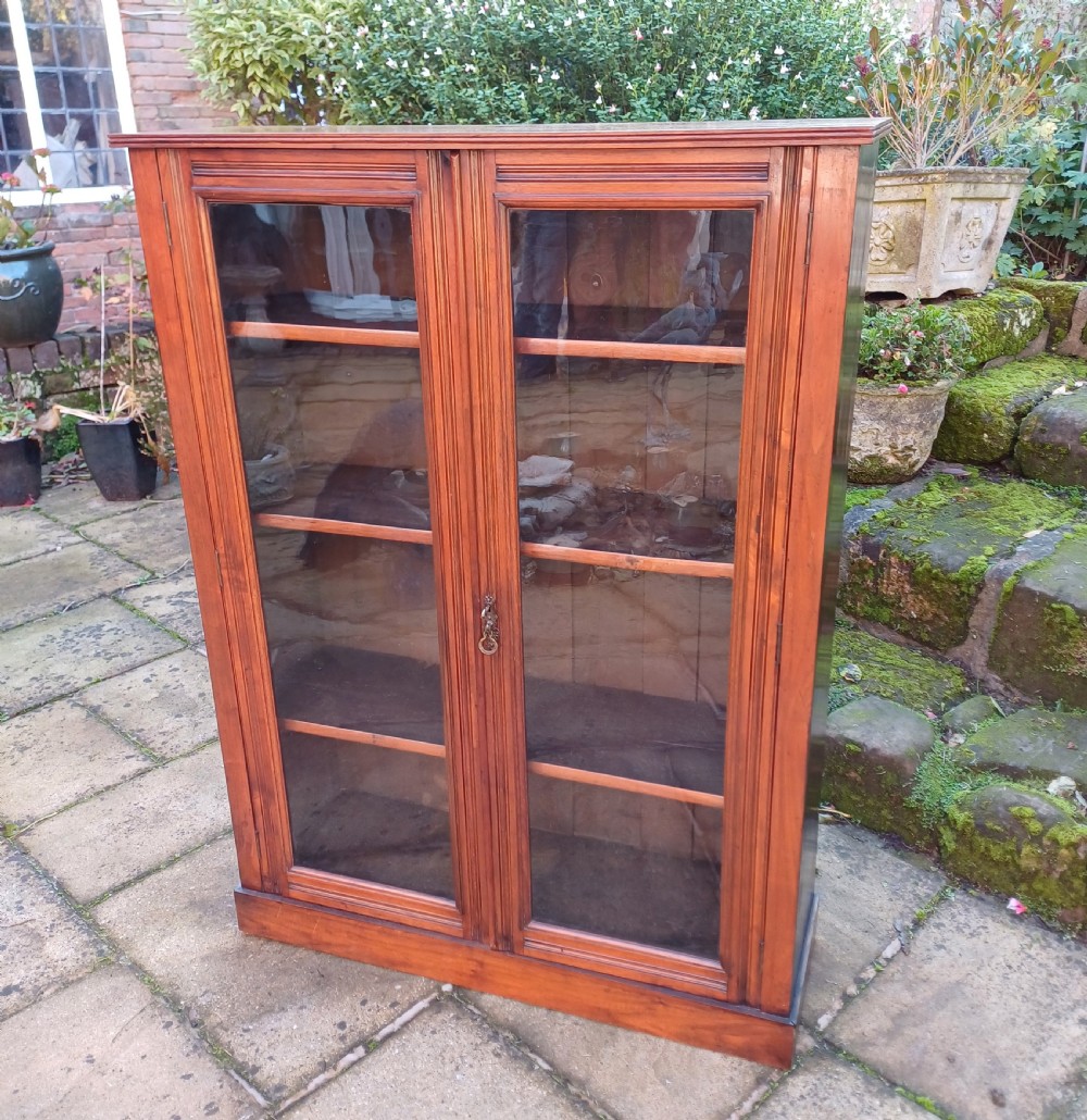 Edwardian walnut glazed bookcase 