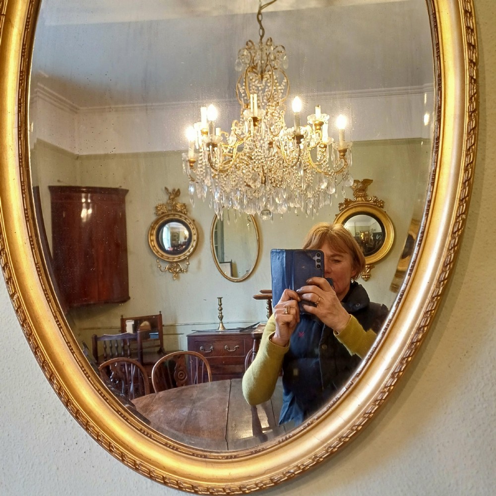 Large oval gilt mirror 19th century  View VII