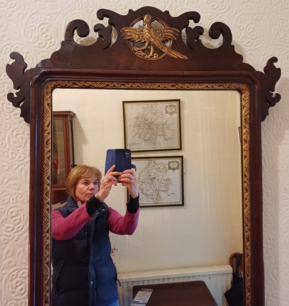 A large fret fretcut mahogany wall mirror.  Chippendale.  Georgian  View V