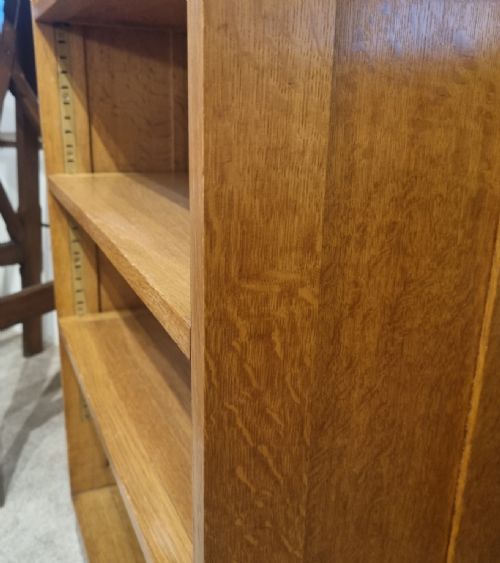A SMALL LIGHT OAK ADJUSTABLE BOOKCASE BY GOOD FURNITURE UNITS IN THE MANNER OF HEALS - ADDITIONAL PHOTO 8