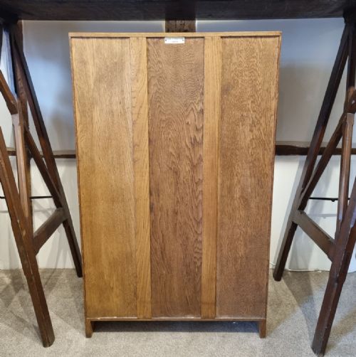 A SMALL LIGHT OAK ADJUSTABLE BOOKCASE BY GOOD FURNITURE UNITS IN THE MANNER OF HEALS - ADDITIONAL PHOTO 11