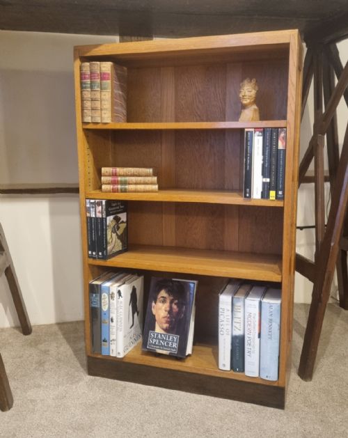 A SMALL LIGHT OAK ADJUSTABLE BOOKCASE BY GOOD FURNITURE UNITS IN THE MANNER OF HEALS - ADDITIONAL PHOTO 12