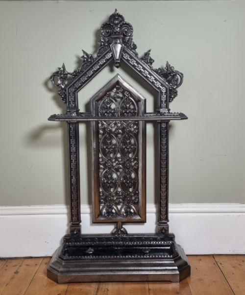 A FINE CAST IRON STICK STAND AESTHETIC MOVEMENT DATED1869
