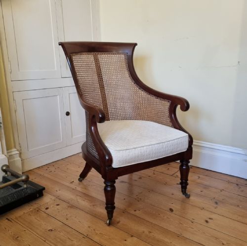 an antique mahogany bergre library chair - CATEGORY: ANTIQUE CHAIRS - DATED 19TH CENTURY
