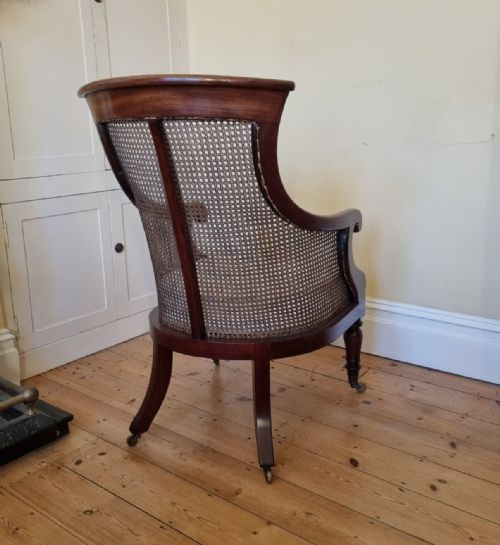 AN ANTIQUE MAHOGANY BERGRE LIBRARY CHAIR - ADDITIONAL PHOTO 5