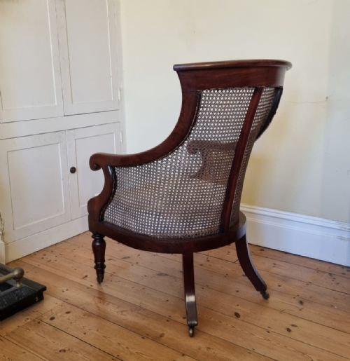 AN ANTIQUE MAHOGANY BERGRE LIBRARY CHAIR - ADDITIONAL PHOTO 6