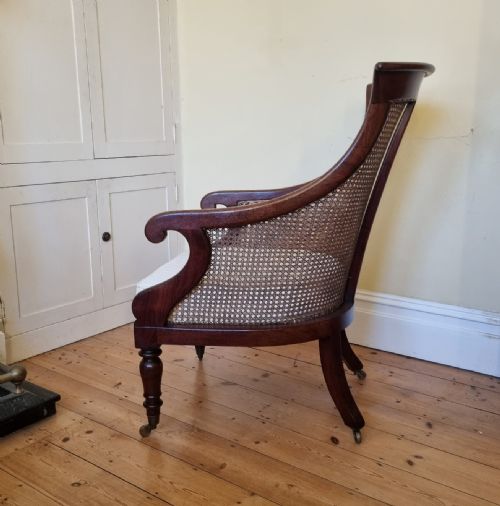 AN ANTIQUE MAHOGANY BERGRE LIBRARY CHAIR - ADDITIONAL PHOTO 7