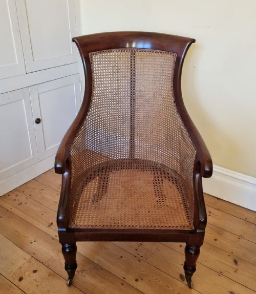 AN ANTIQUE MAHOGANY BERGRE LIBRARY CHAIR - ADDITIONAL PHOTO 15