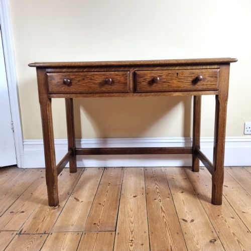 A 1920S OAK TWODRAWER SIDE TABLE IN THE MANNER OF THE COTSWOLD SCHOOL - ADDITIONAL PHOTO 4
