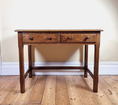 A 1920S OAK TWODRAWER SIDE TABLE IN THE MANNER OF THE COTSWOLD SCHOOL - ADDITIONAL PHOTO 5