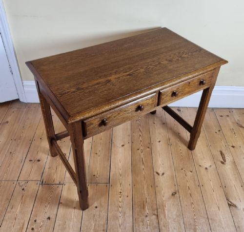 A 1920S OAK TWODRAWER SIDE TABLE IN THE MANNER OF THE COTSWOLD SCHOOL - ADDITIONAL PHOTO 6