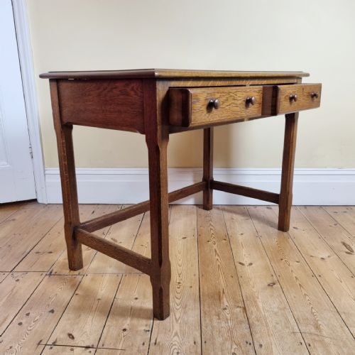 A 1920S OAK TWODRAWER SIDE TABLE IN THE MANNER OF THE COTSWOLD SCHOOL - ADDITIONAL PHOTO 7