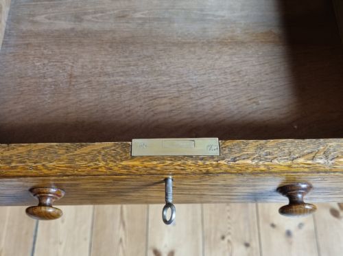 A 1920S OAK TWODRAWER SIDE TABLE IN THE MANNER OF THE COTSWOLD SCHOOL - ADDITIONAL PHOTO 9