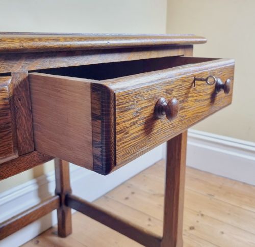 A 1920S OAK TWODRAWER SIDE TABLE IN THE MANNER OF THE COTSWOLD SCHOOL - ADDITIONAL PHOTO 10