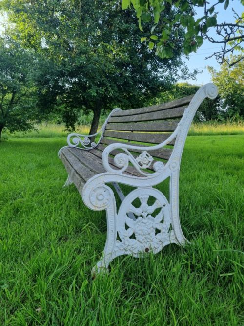 A CAST IRON GARDEN BENCH TO CELEBRATE QUEENS VICTORIA'S GOLDEN JUBILEE IN 1887 - ADDITIONAL PHOTO 1