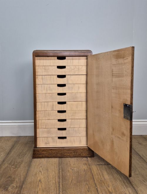 a sycamore enclosed chest of drawers circa 1930 - CATEGORY: ANTIQUE CABINETS - DATED 1930