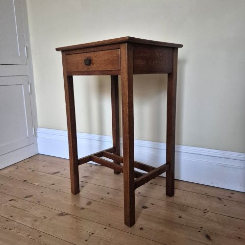 AN OAK SINGLE DRAWER TABLE IN THE MANNER OF HUBERT SIMPSON OF KENDAL - ADDITIONAL PHOTO 1