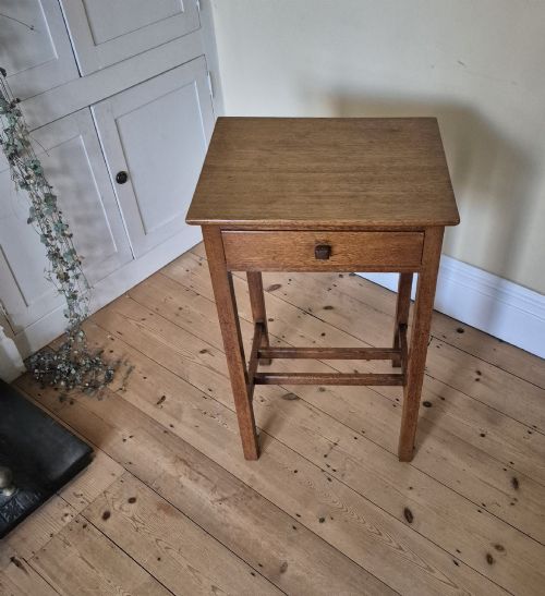 AN OAK SINGLE DRAWER TABLE IN THE MANNER OF HUBERT SIMPSON OF KENDAL - ADDITIONAL PHOTO 2
