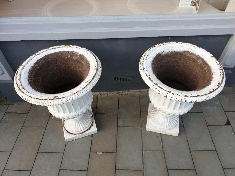 Pair of large 19th Century cast iron urns attributed to Andrew Handyside & Co. of Derby  View III