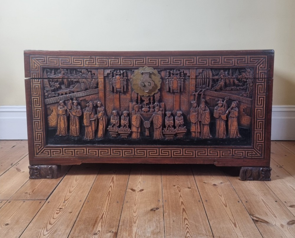 A finely carved camphor wood chest 