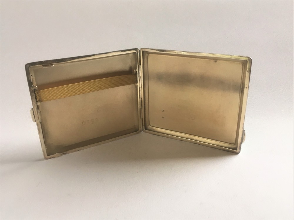 A stunning silver & guilloche enamel cigarette case View VII