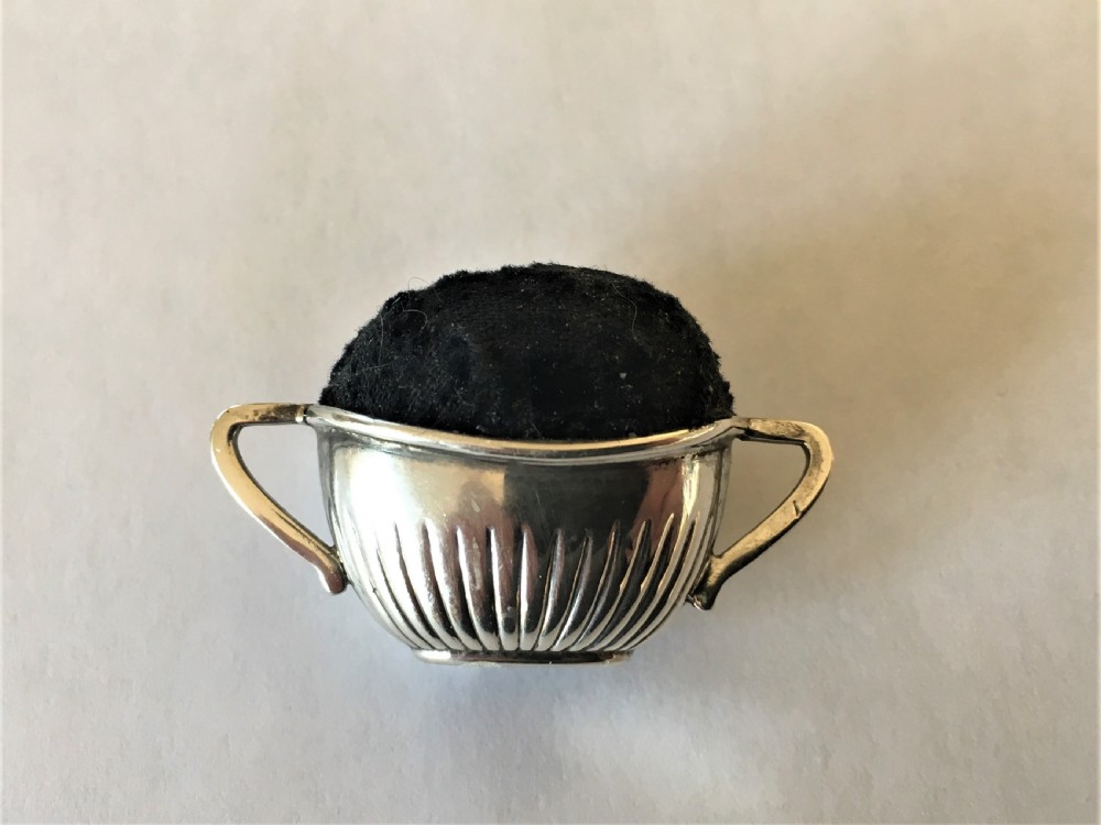 A  novelty Edwardian silver pin cushion View V
