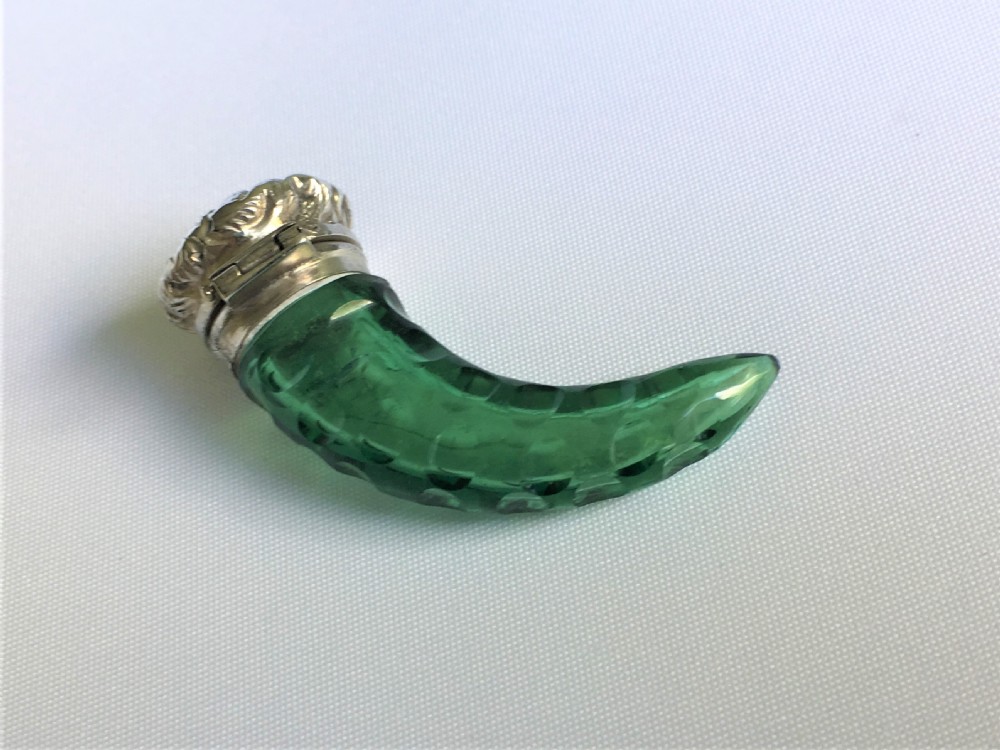 A gorgeous Victorian silver mounted cornucopia scent bottle
