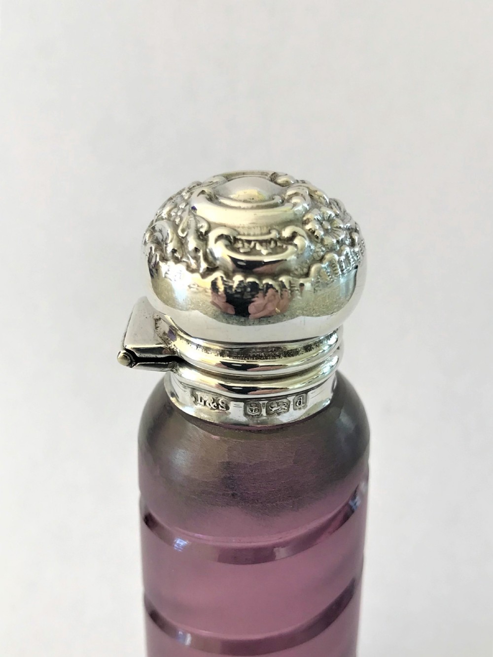 A lovely Edwardian silver mounted amethyst scent bottle View V
