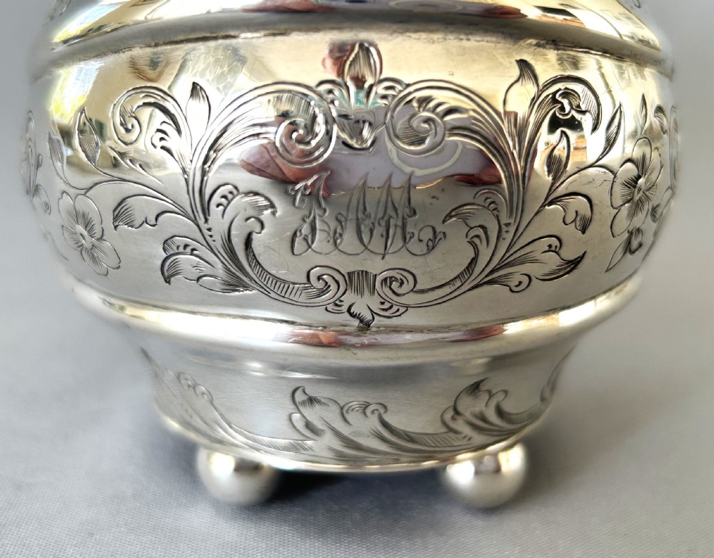 A lovely silver gilt Georgian cream jug View V