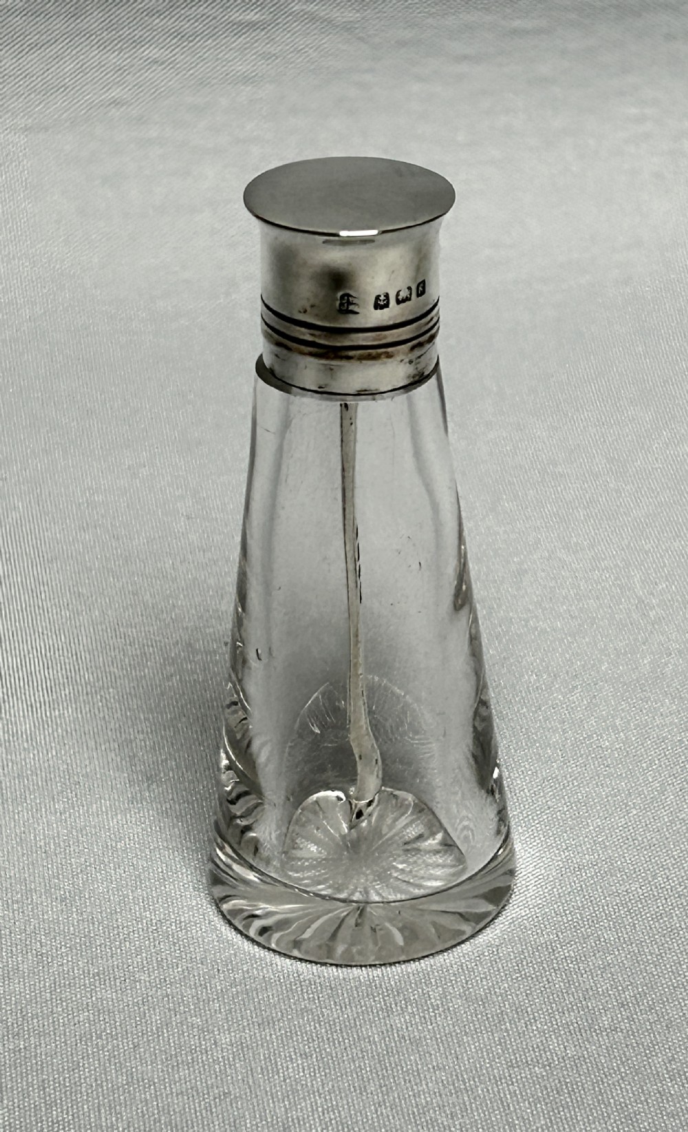 A rare Hukin & Heath 3 part silver mounted cayenne bottle 