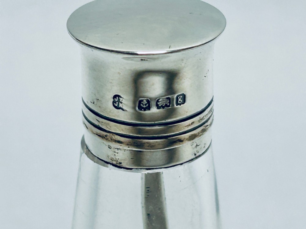 A rare Hukin & Heath 3 part silver mounted cayenne bottle  View III