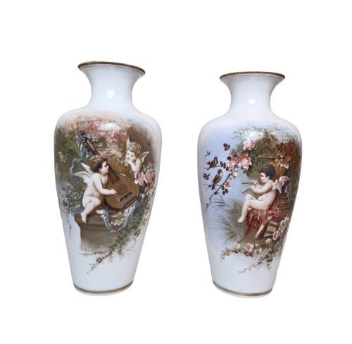 Antique Pair of Porcelain Vases Depicting Cherubs in a Garden