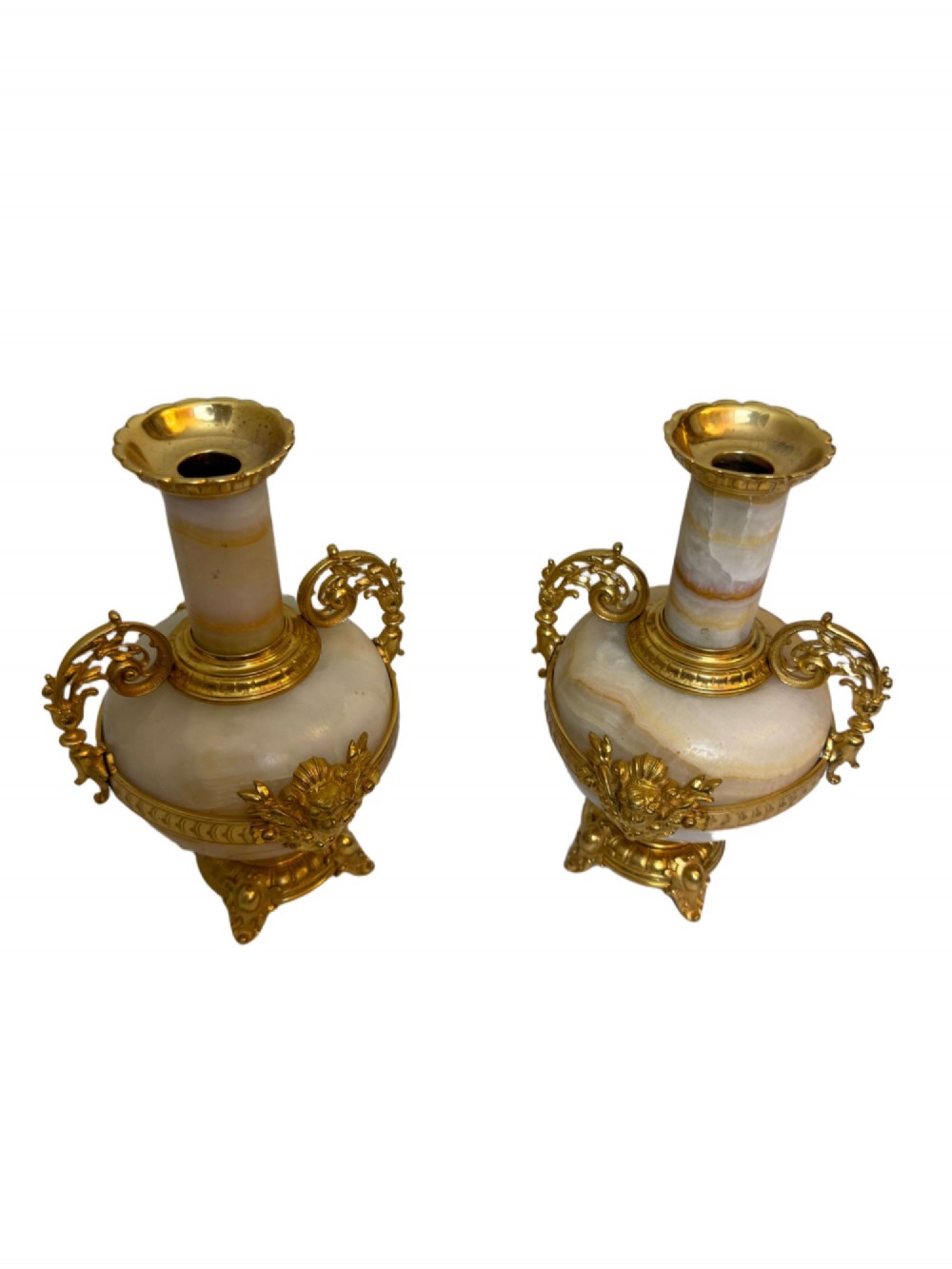 A pair of 19th-century French vases constructed from cream white veined onyx with ornate gilt bronze handles, winged cherub mounts, and footed bases. View III